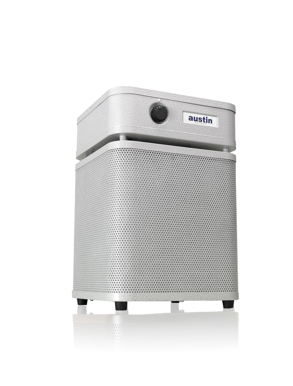 Austin portable air purifier in a metallic silver finish with a perforated front grille and a top control panel, shown on a white background with a soft reflection.