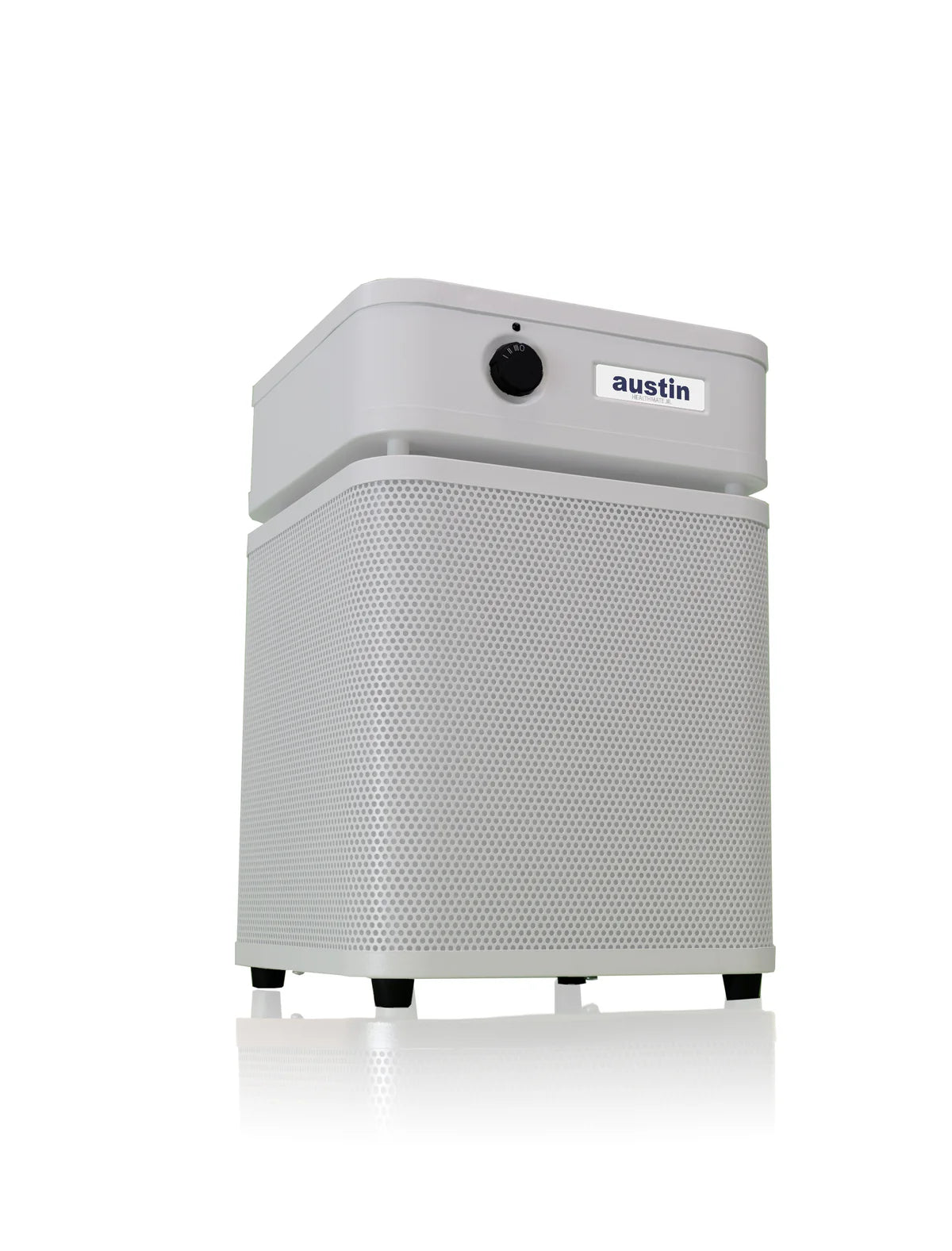 A light gray Austin air purifier with a perforated front grille and a top control panel, shown on a white background with a soft reflection.