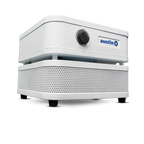 A white Austin air purifier with a perforated front grille, a top control unit with a black dial, and a blue and white Austin logo, shown on a clean white background.