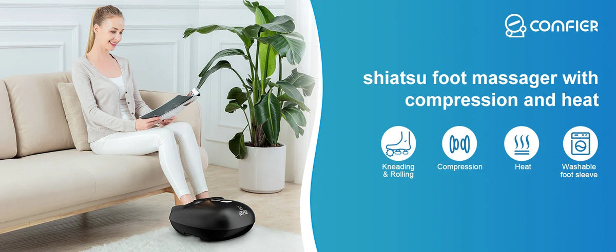 A woman sits on a beige sofa reading a magazine while using a black COMFIER shiatsu foot massager on the floor. The right side of the image features a blue graphic panel with product features and icons.