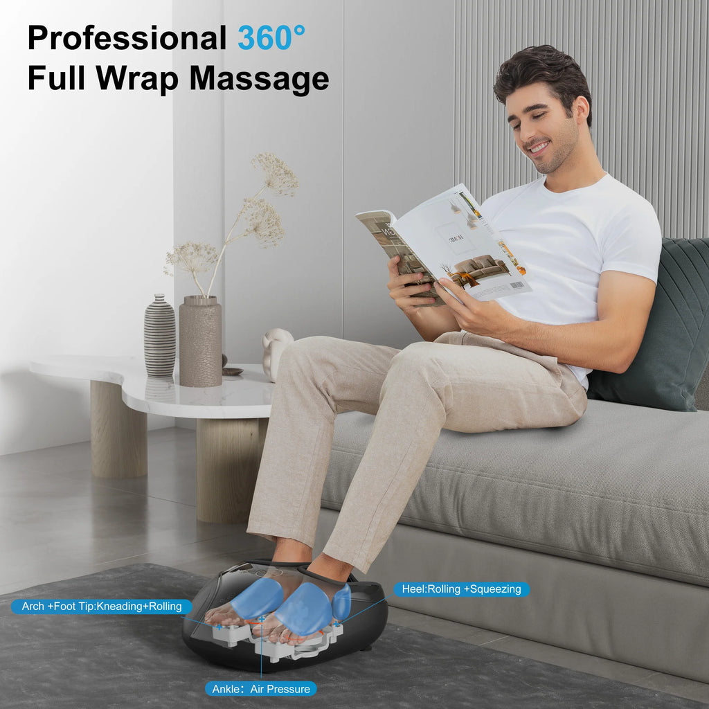 A man sits on a gray sofa reading a magazine while using a black foot massage device on his feet. The scene includes text overlays describing massage functions such as arch, foot tip kneading, rolling, heel rolling and squeezing, and a headline reading 'Professional 360° Full Wrap Massage.