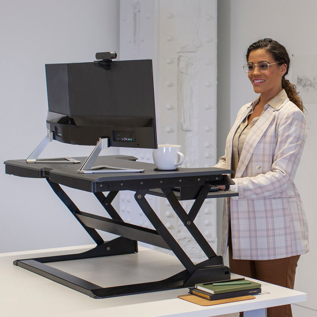 Ergotron WorkFit-TL Standing Desk Workstation – Height Adjustable Sit-Stand Desk Converter with Black Frame & Grey Surface
