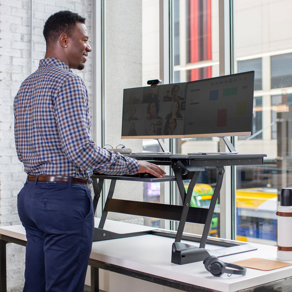 Ergotron WorkFit-TL Standing Desk Workstation – Height Adjustable Sit-Stand Desk Converter with Black Frame & Grey Surface