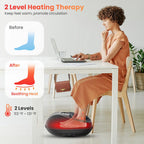 A woman sits at a white desk using a red and black foot massage heating pad on her feet. The image includes marketing text and before/after graphics showing foot circulation benefits.