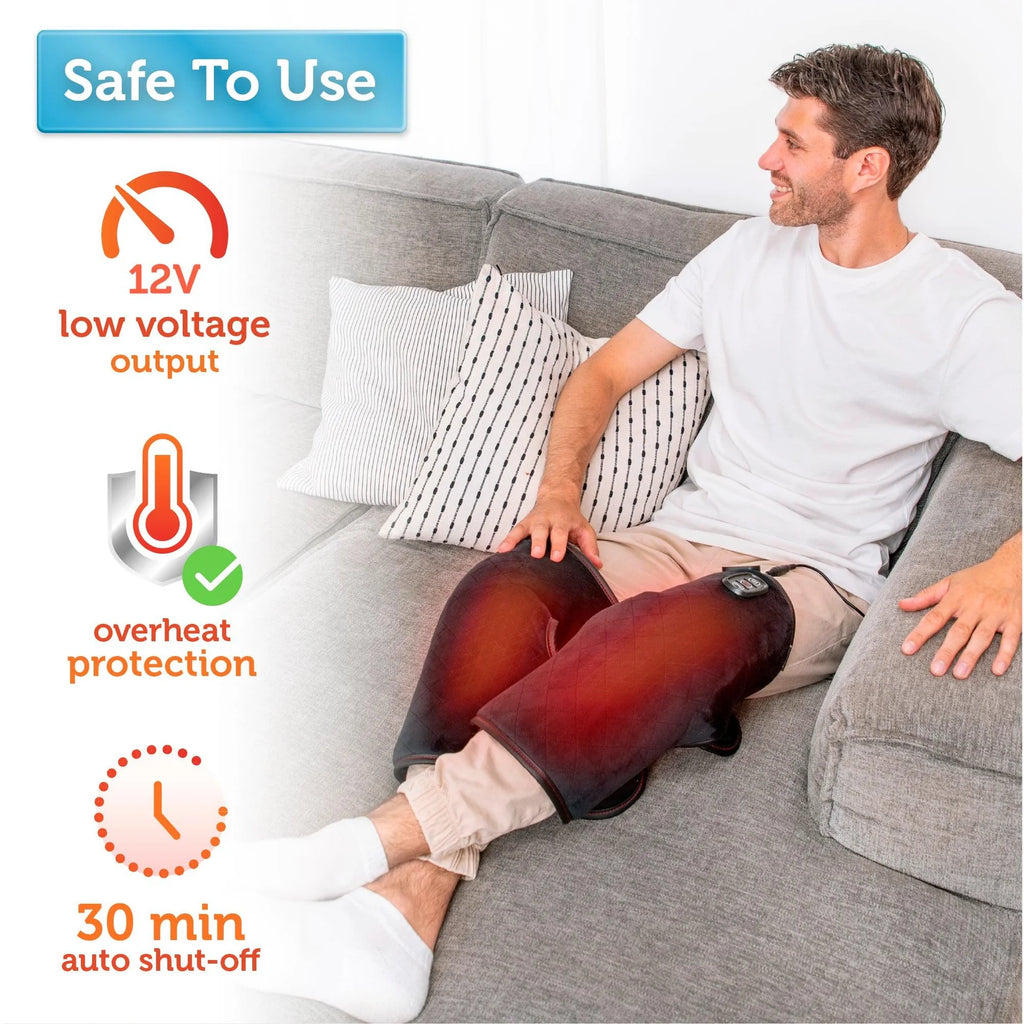 Man using a knee heated massager on a couch with safety features highlighted.